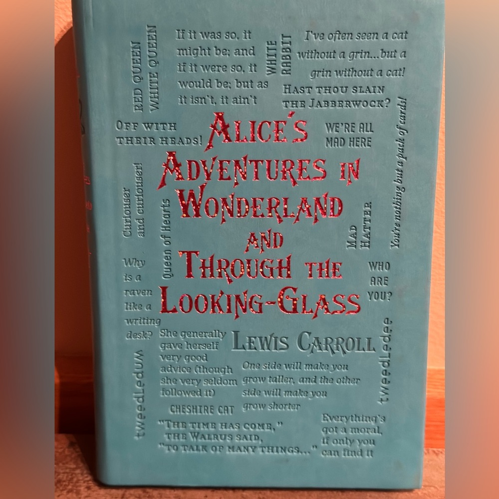 Alice’s Adventures in Wonderland Through the Looking Glass embossed faux leather